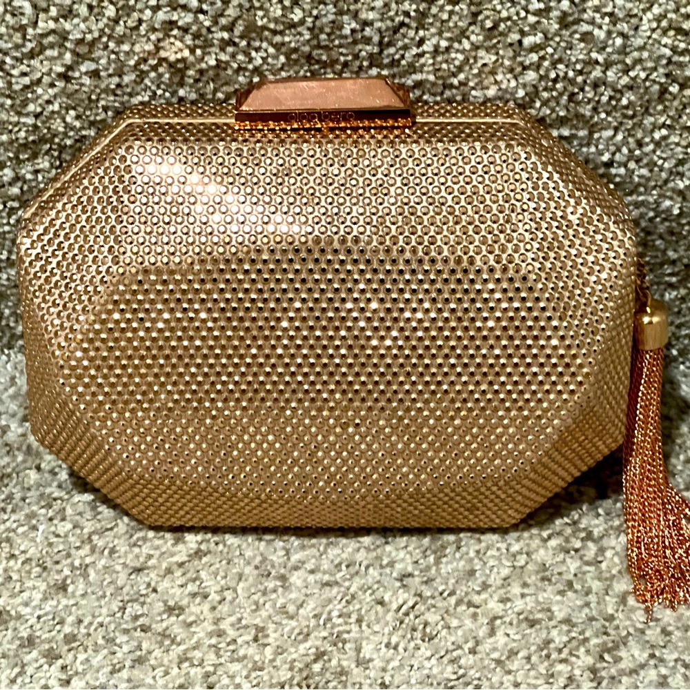 Olga Berg Tilly Hotfix Clutch with tassel in rose gold. NWOT